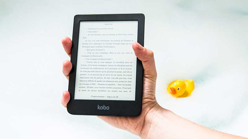 hand holding a kobo ebook reader