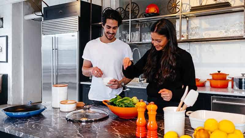 couple cooking dinner