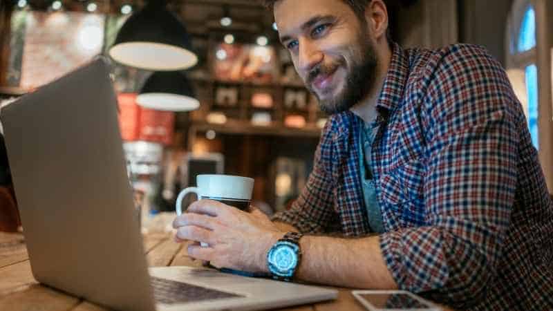 man working in cafe