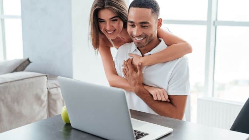 couple viewing a laptop
