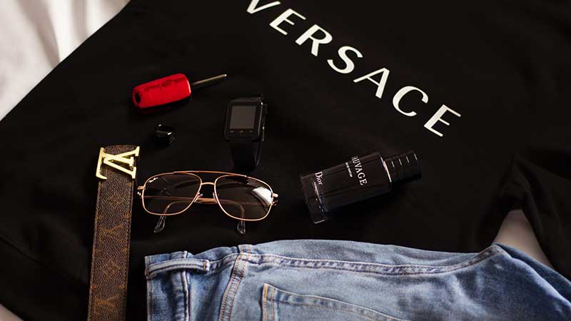 A Versace shirt and jeans